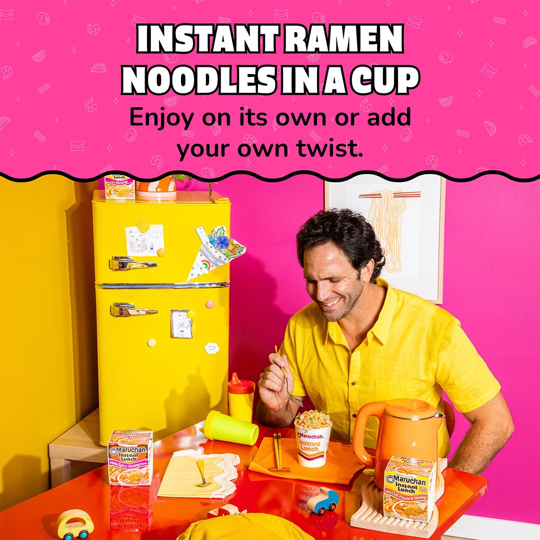 Spoon lifting Maruchan broth detail showing savory shrimp broth and bold chili aroma
