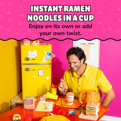 Spoon lifting Maruchan broth detail showing savory shrimp broth and bold chili aroma