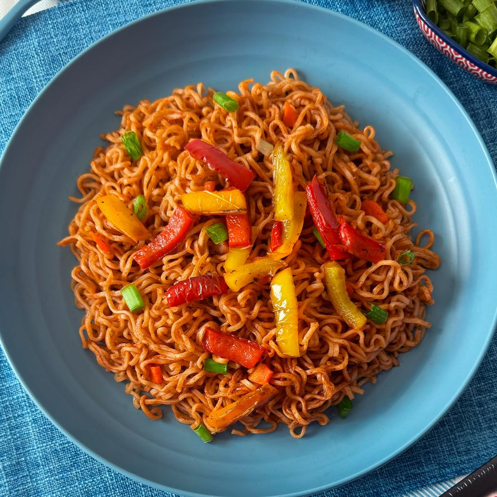 Maruchan Fire Yakisoba prepared bowl in hand showing ready-to-eat convenience and heat
