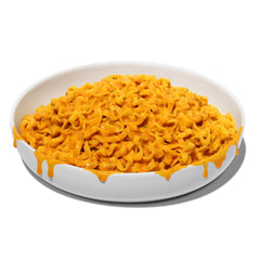 Maruchan served bowl of Sweet Cheese noodles with toppings showing quick meal appeal