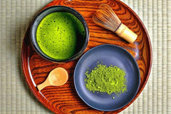 Marukyu Koyamaen whisking matcha in bowl creates frothy foam