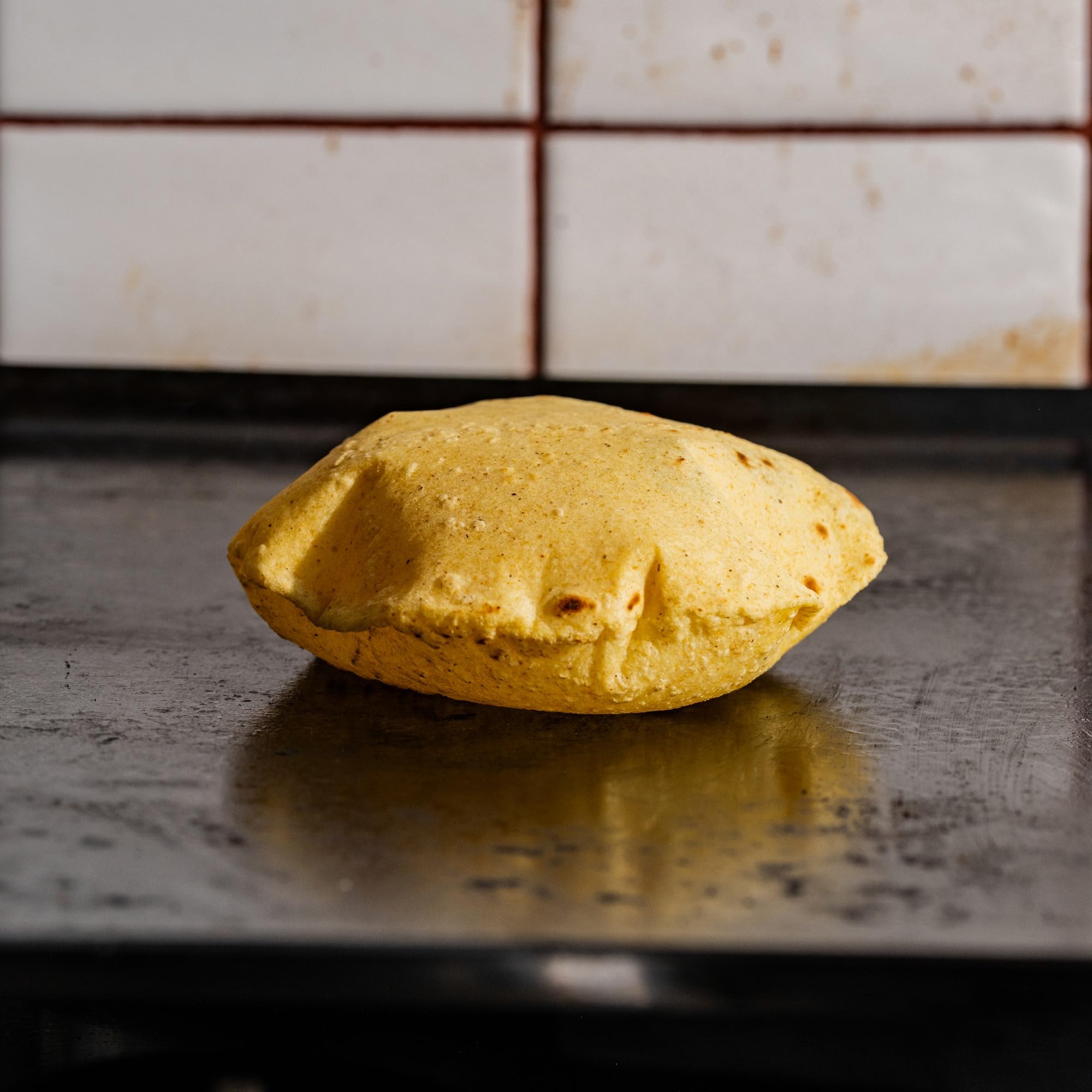 Masienda dough ball formed from masa showing elastic, easy‑to‑shape consistency