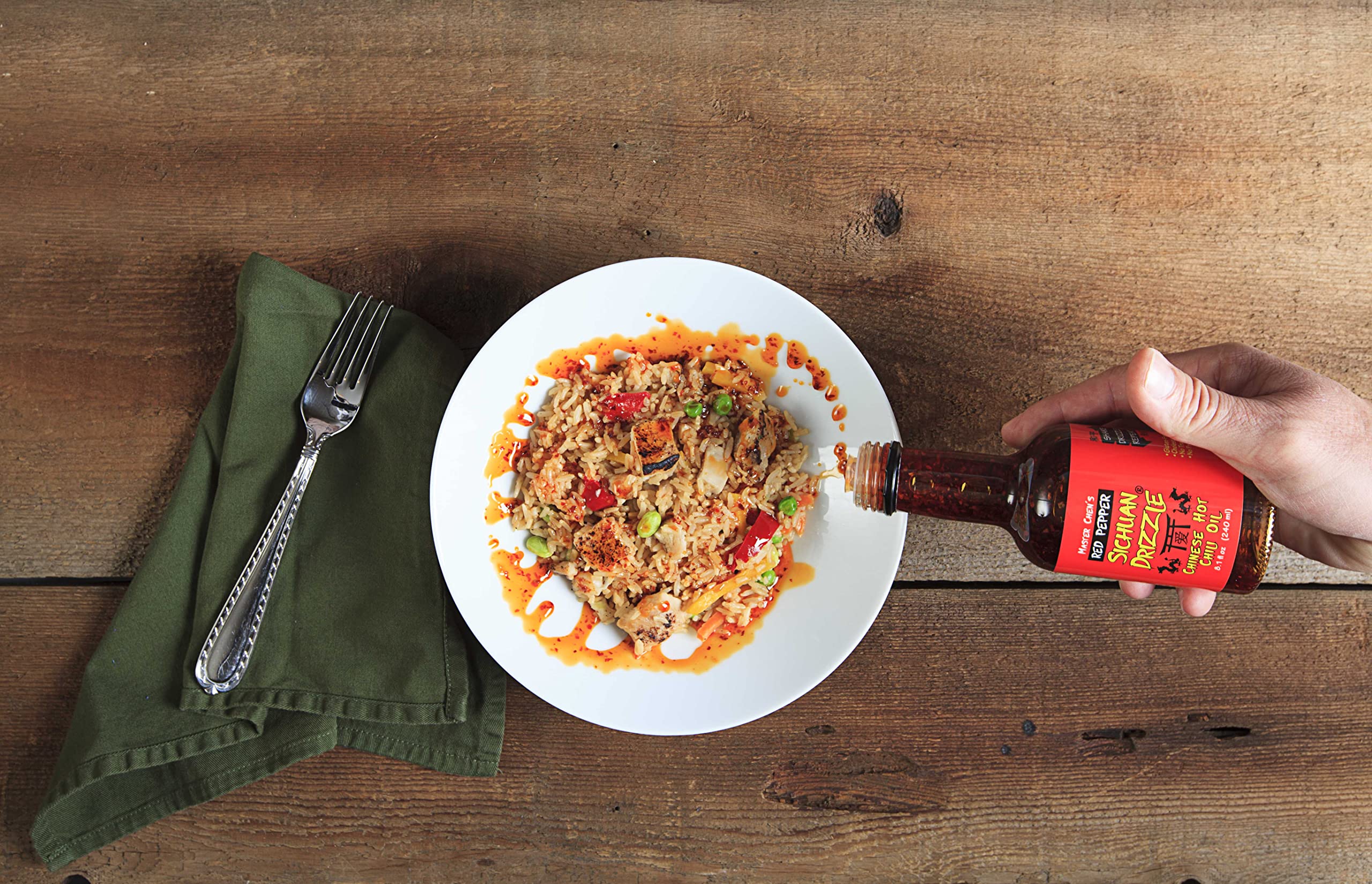 Master Chen's spoon with flakes highlighting crunchy texture and heat