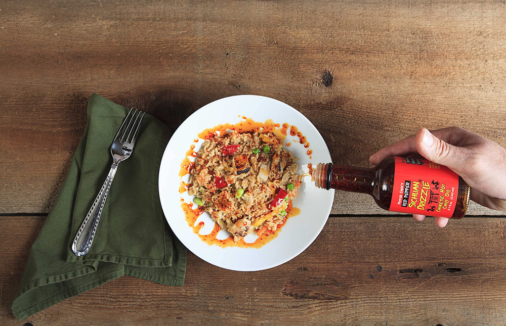 Master Chen's spoon with flakes highlighting crunchy texture and heat