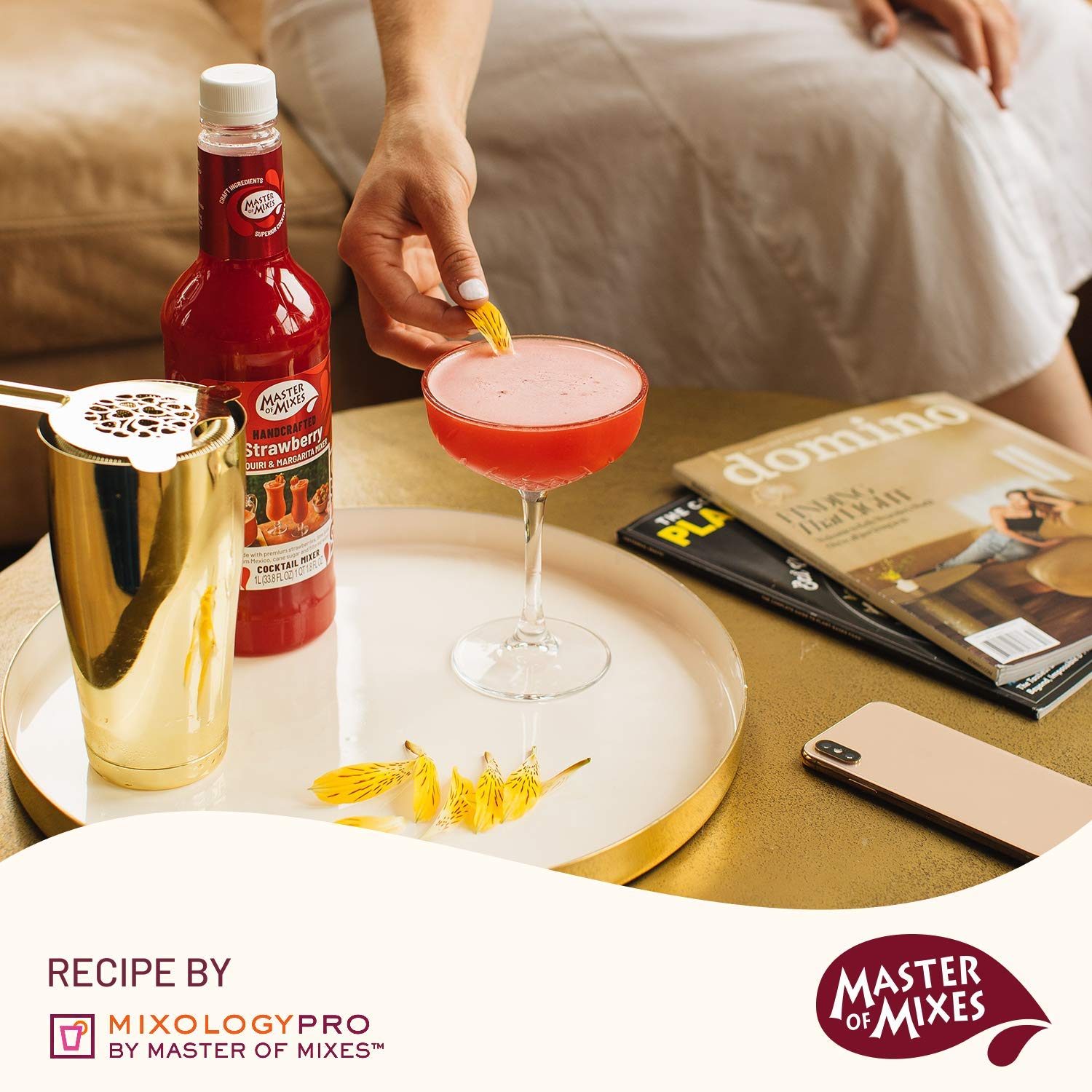 MASTER OF MIXES blended frozen strawberry daiquiri garnished for serving