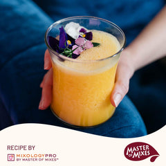 MASTER OF MIXES frozen mango daiquiri served with garnish and refreshing appeal
