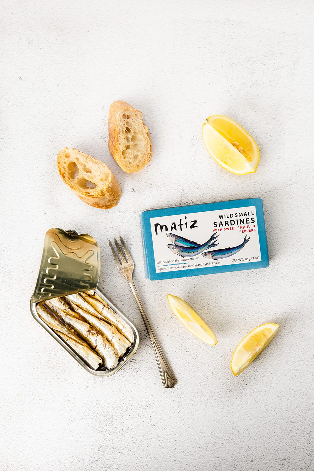 Matiz sardinillas on toasted bread displaying quick serving idea