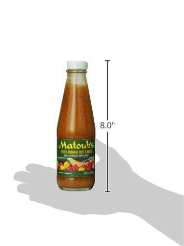Matouk's sauce drizzled over grilled chicken showing application and flavor boost