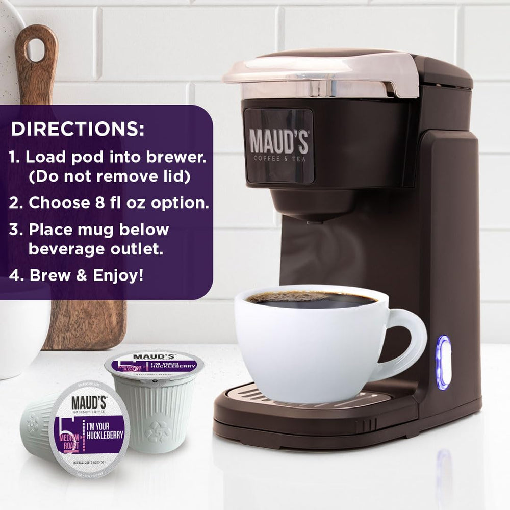 MAUD'S coffee cup on breakfast table pairing with pastries