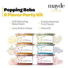 Mayde close-up of strawberry popping boba pearls illustrating juicy centers and vivid color for flavor impact