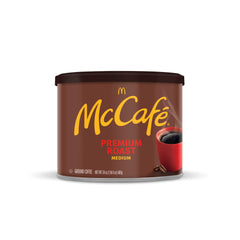 McCafé canister opened to reveal fresh grounds and airtight packaging benefit
