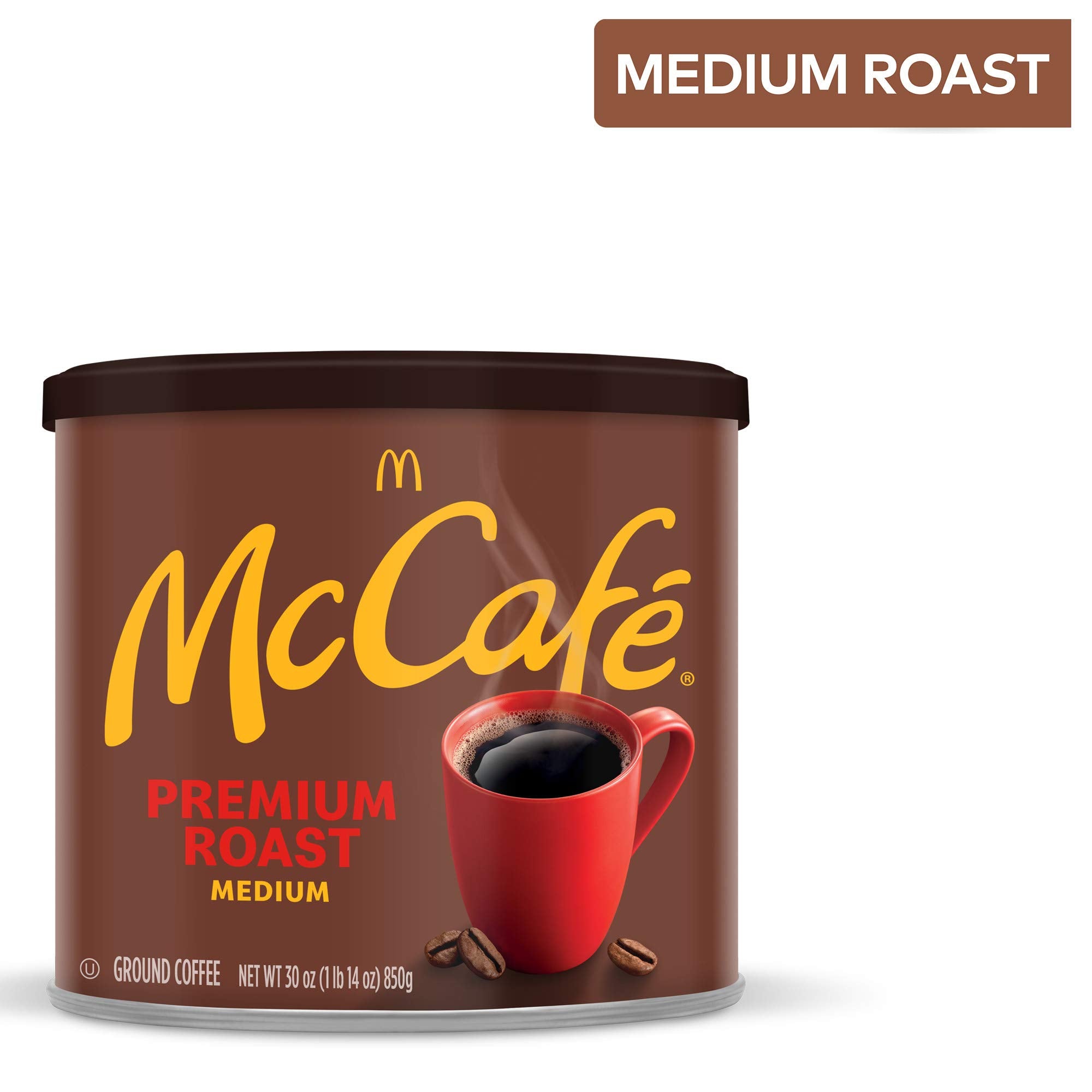 McCafé canister beside a coffee bag for scale, showing family‑size supply