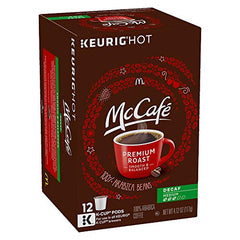 McCafé pods beside a coffee cup for scale demonstrating portion control and storage ease