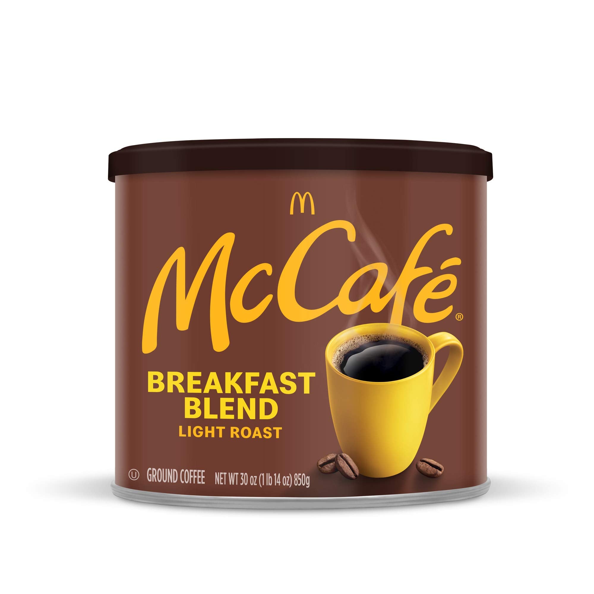 Hand holding McCafe 30 oz canister to show scale and generous quantity