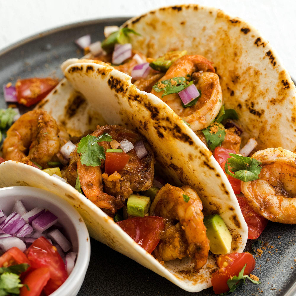 McCormick assembled soft tacos with toppings showing tasty serving inspiration