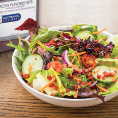McCormick Culinary sprinkled on salad adding savory flavor and crisp contrast