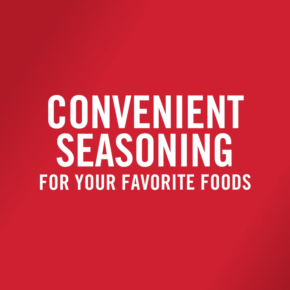 McCormick black pepper grinder active over steak for bold seasoning