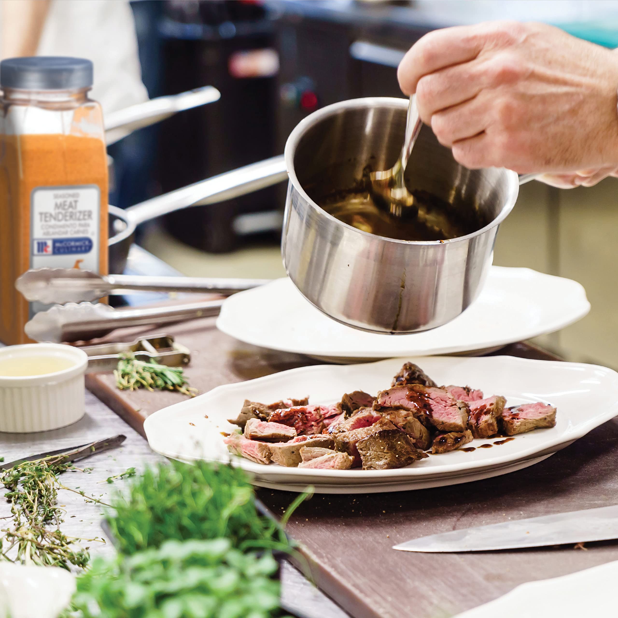 McCormick Culinary being applied to steak before cooking showing tenderizing benefit