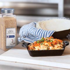 McCormick Culinary garlic scoop and measuring spoon illustrating easy portion control