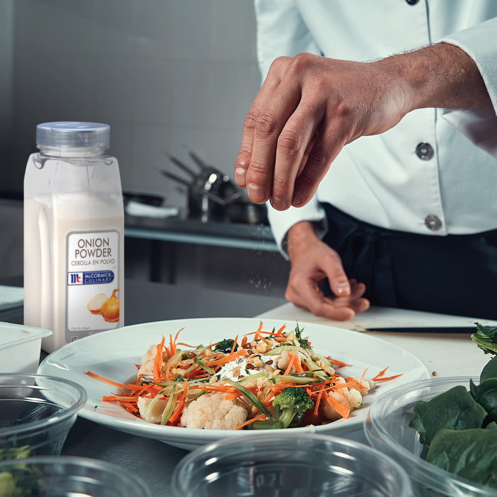 McCormick Culinary bottle in hand showing 20 oz scale and convenience