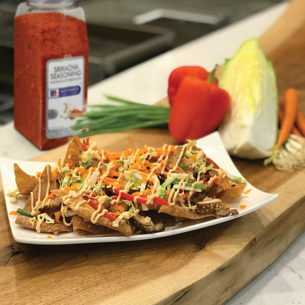 McCormick Culinary sprinkled on fries illustrating bold sriracha flavor boost for appetizers
