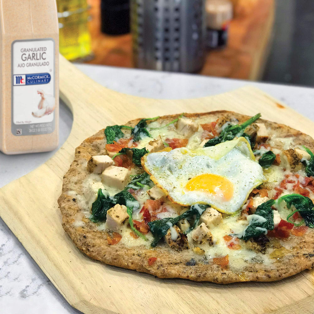 McCormick Culinary granulated garlic dusting on breadsticks giving aromatic crust