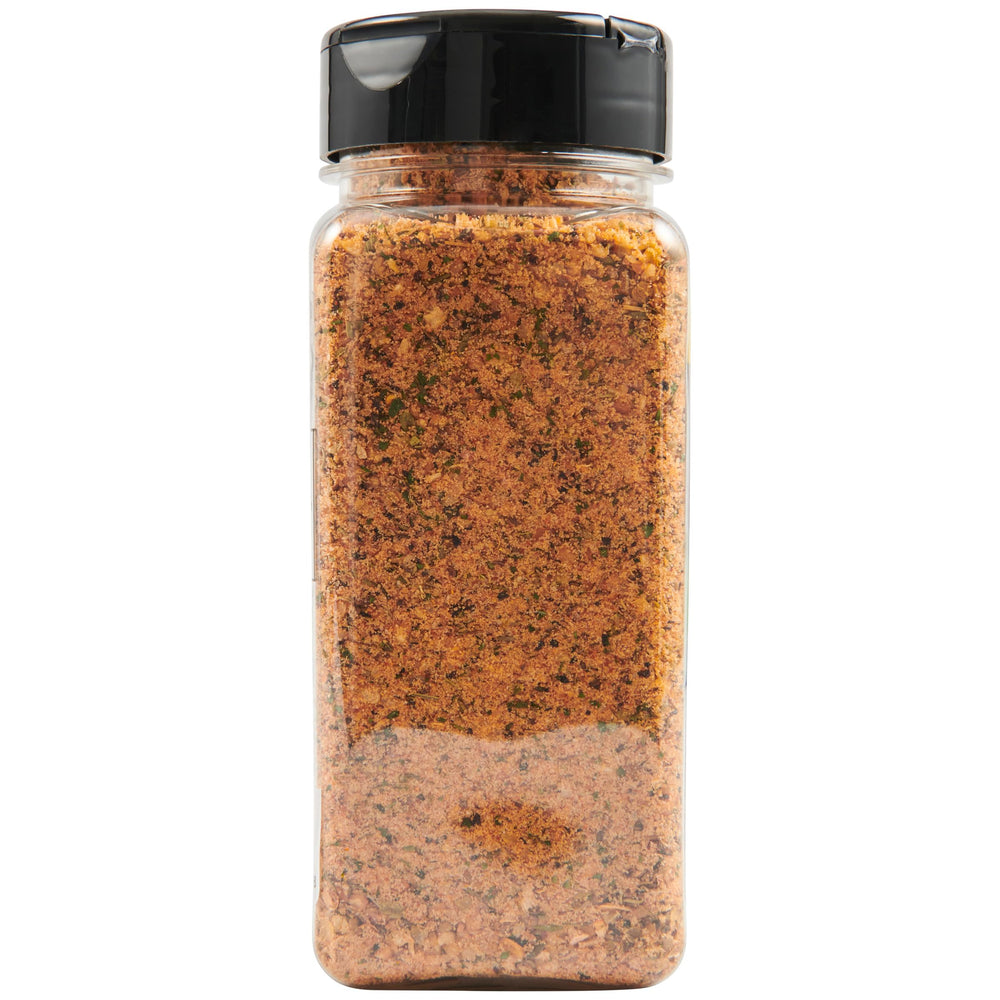 Outdoor backyard grill scene with McCormick seasoning in use, elevates weekend cookouts