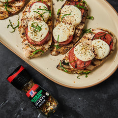 McCormick close-up of Italian herb blend displaying garlic, tomato and herbs for robust flavor