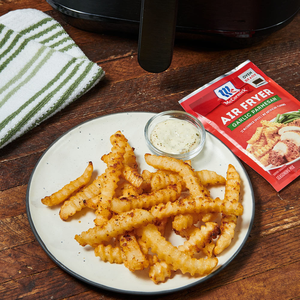 McCormick dinner table scene with air-fried chicken showing family-ready convenience