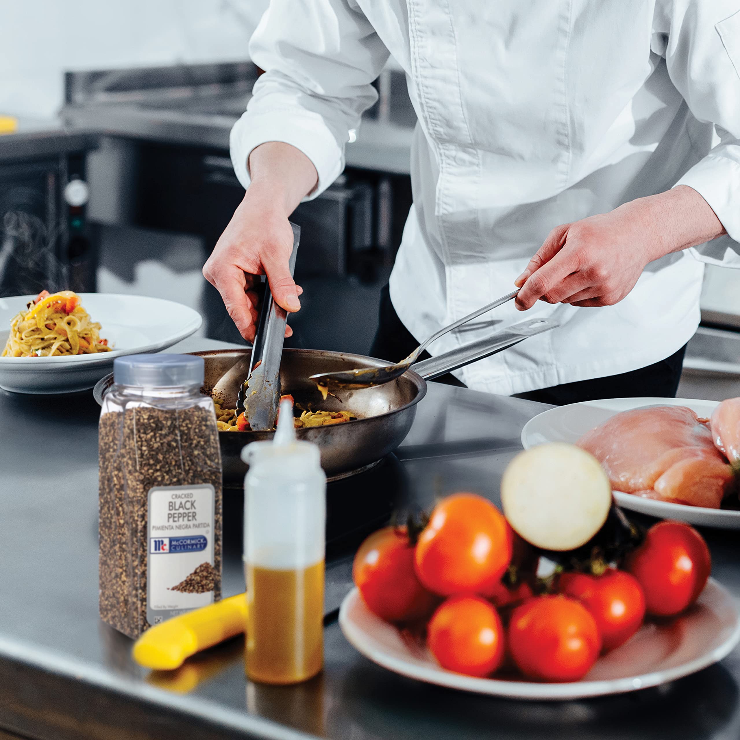 Spoonful of McCormick cracked pepper ready to season with consistent coarse pieces