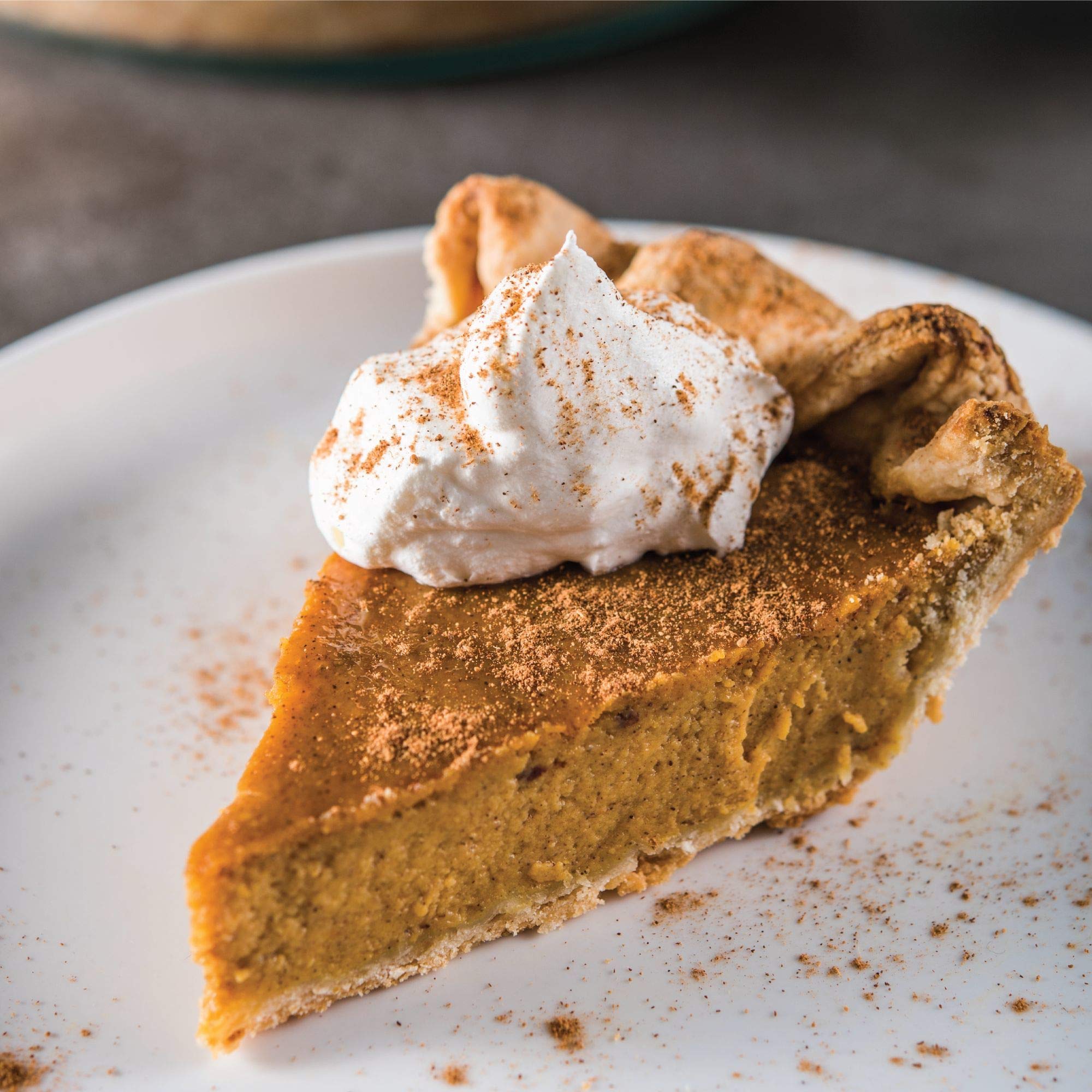 Latte topped with McCormick Pumpkin Pie Spice adding cozy beverage flavor