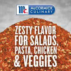 McCormick Culinary pouring seasoning onto green salad for crunchy, savory finish