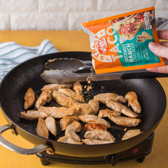 McCormick seasoning simmering with chicken in skillet for fast dinner prep benefit