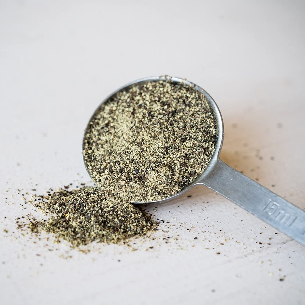 McCormick sprinkled on salad offering visible pepper finish and brightened taste