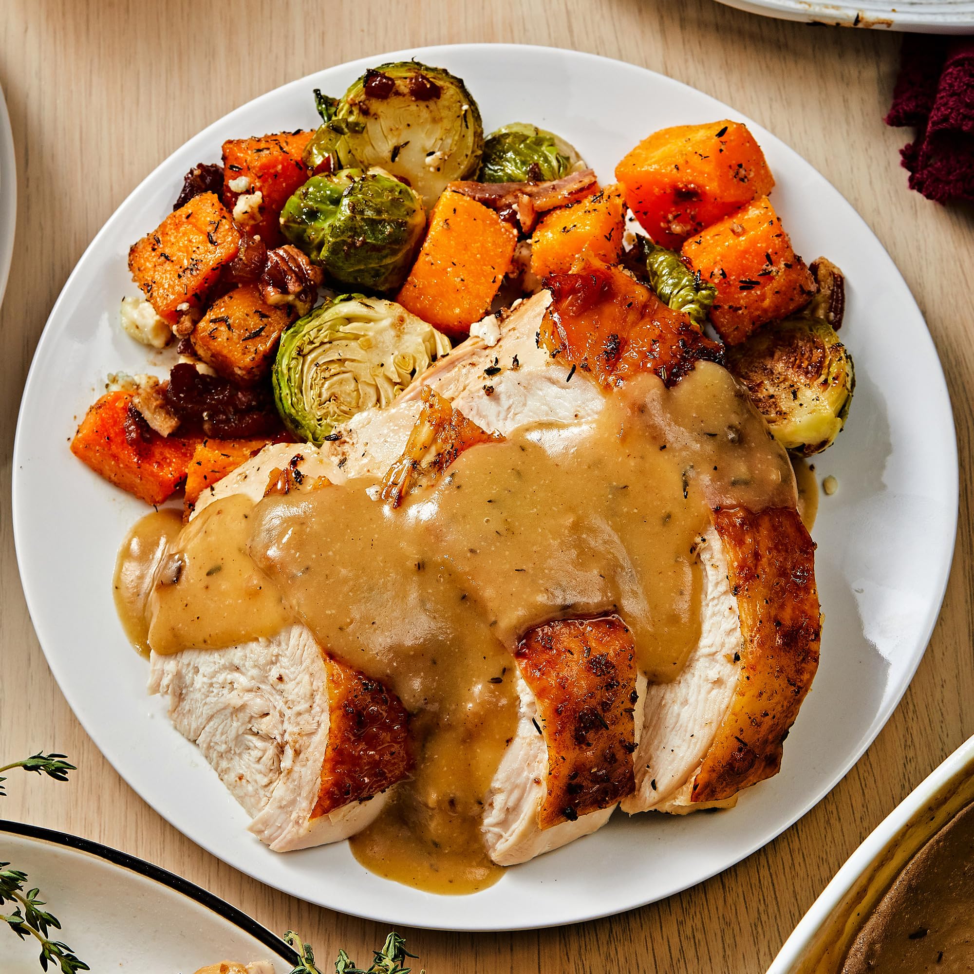 McCormick turkey gravy poured over mashed potatoes, enhances dinner flavor instantly
