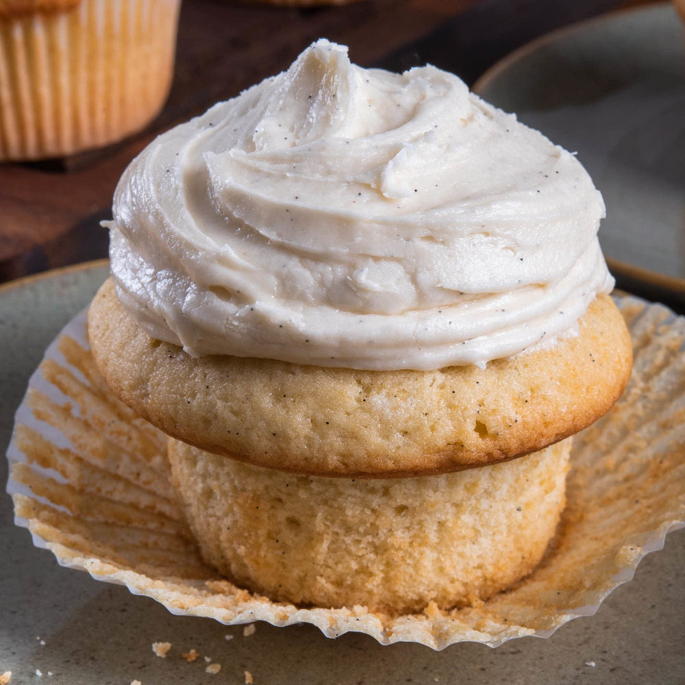 Paste being poured into cake batter, McCormick blends without clumping