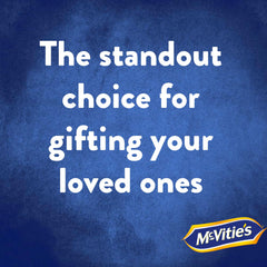 Hand holding McVitie's biscuit to show scale and approachable snack portion