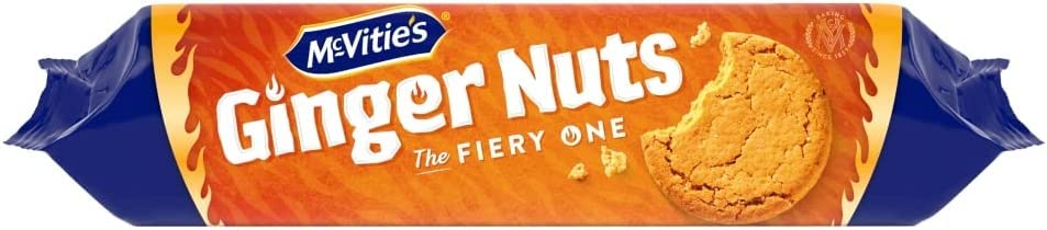 Stack of McVitie's Ginger Nuts beside a ruler to show biscuit size and portion scale