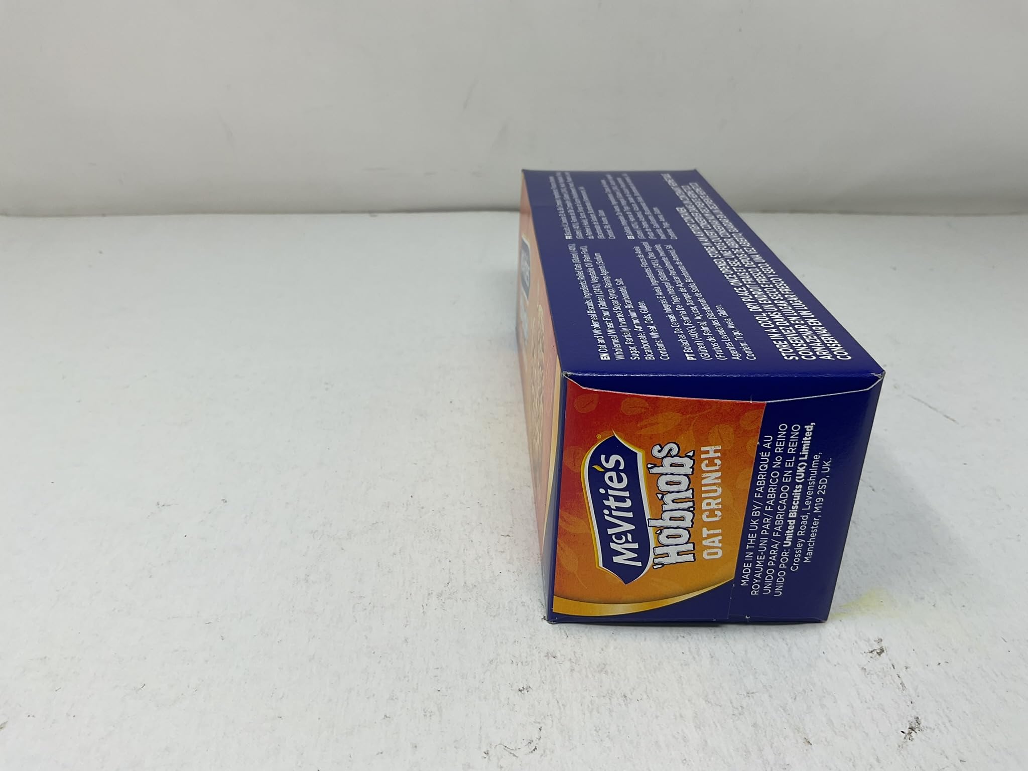 McVitie's biscuit held in hand showing size and portion