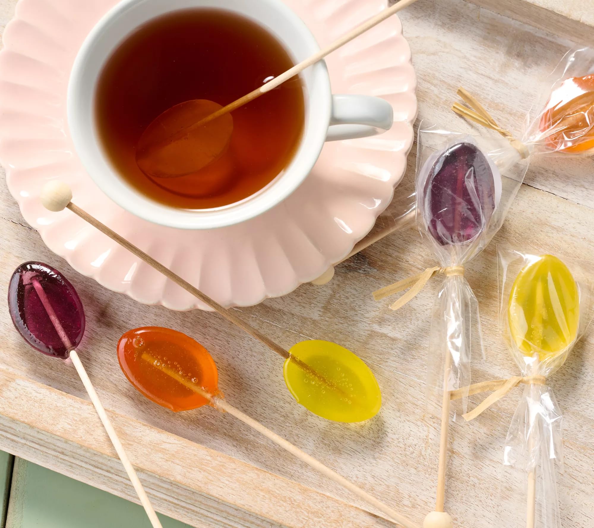 Melville Candy open gift box display with six wrapped spoons for elegant gifting benefit
