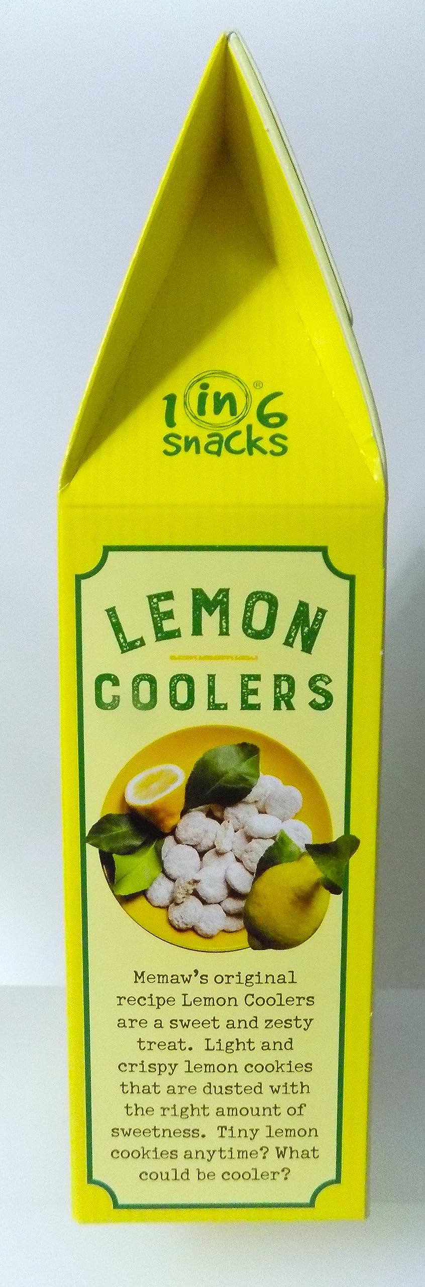 Hand holding Lemon Coolers box to show scale and portable 4oz snack from Memaw's Country Kitchen