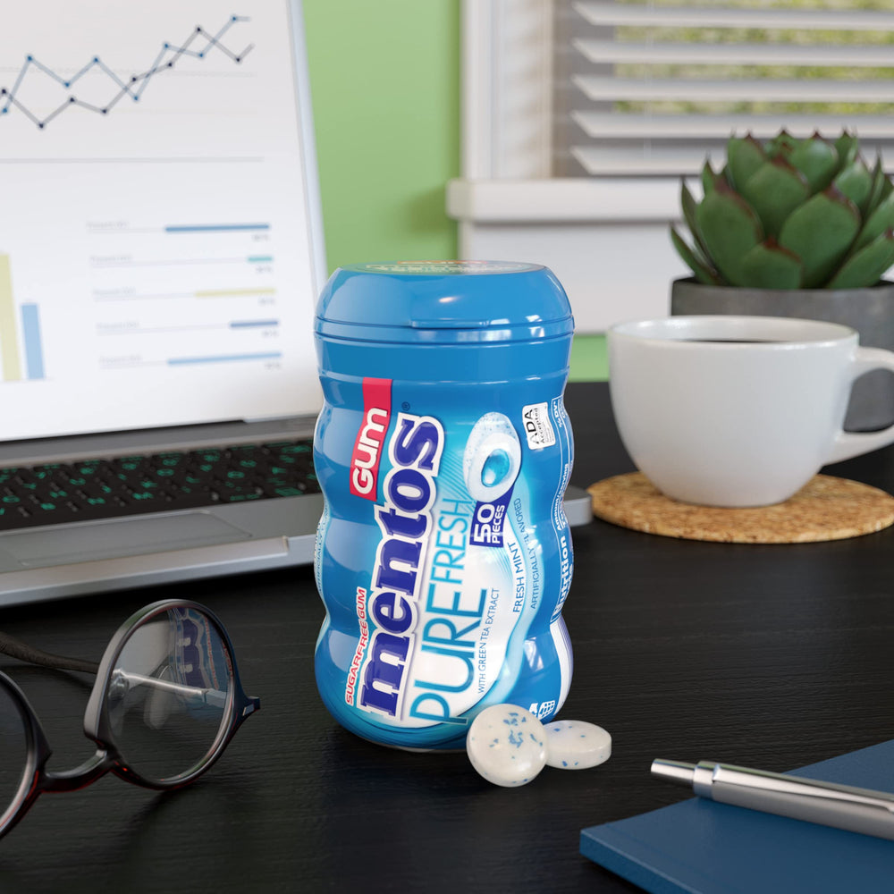 Open Mentos bottle cap demonstrating easy access and reseal benefit