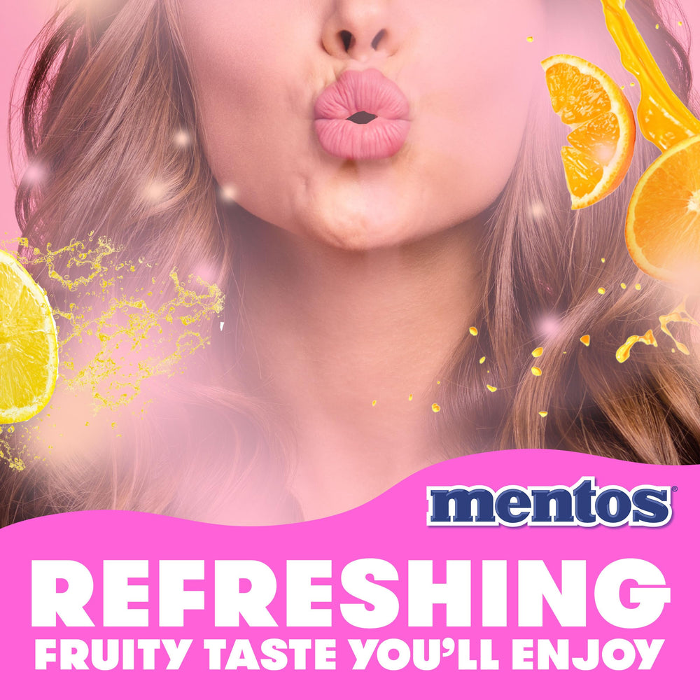 Scattered Mentos candies showing colorful pieces and shareable benefit