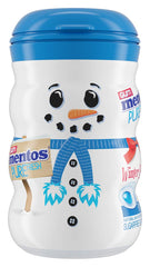 Close-up of Mentos gum piece texture showing smooth mint surface for lasting flavor