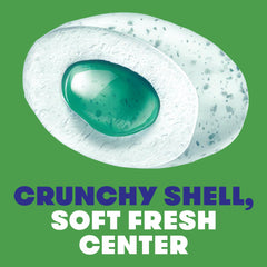 Close-up of Mentos gum piece texture showing smooth chew and flavor release