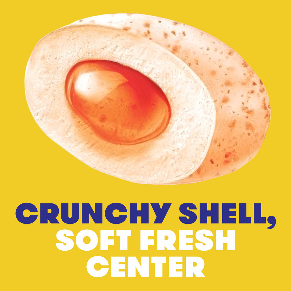 Detailed texture of Mentos crunchy shell showing crisp coating benefit immediate burst