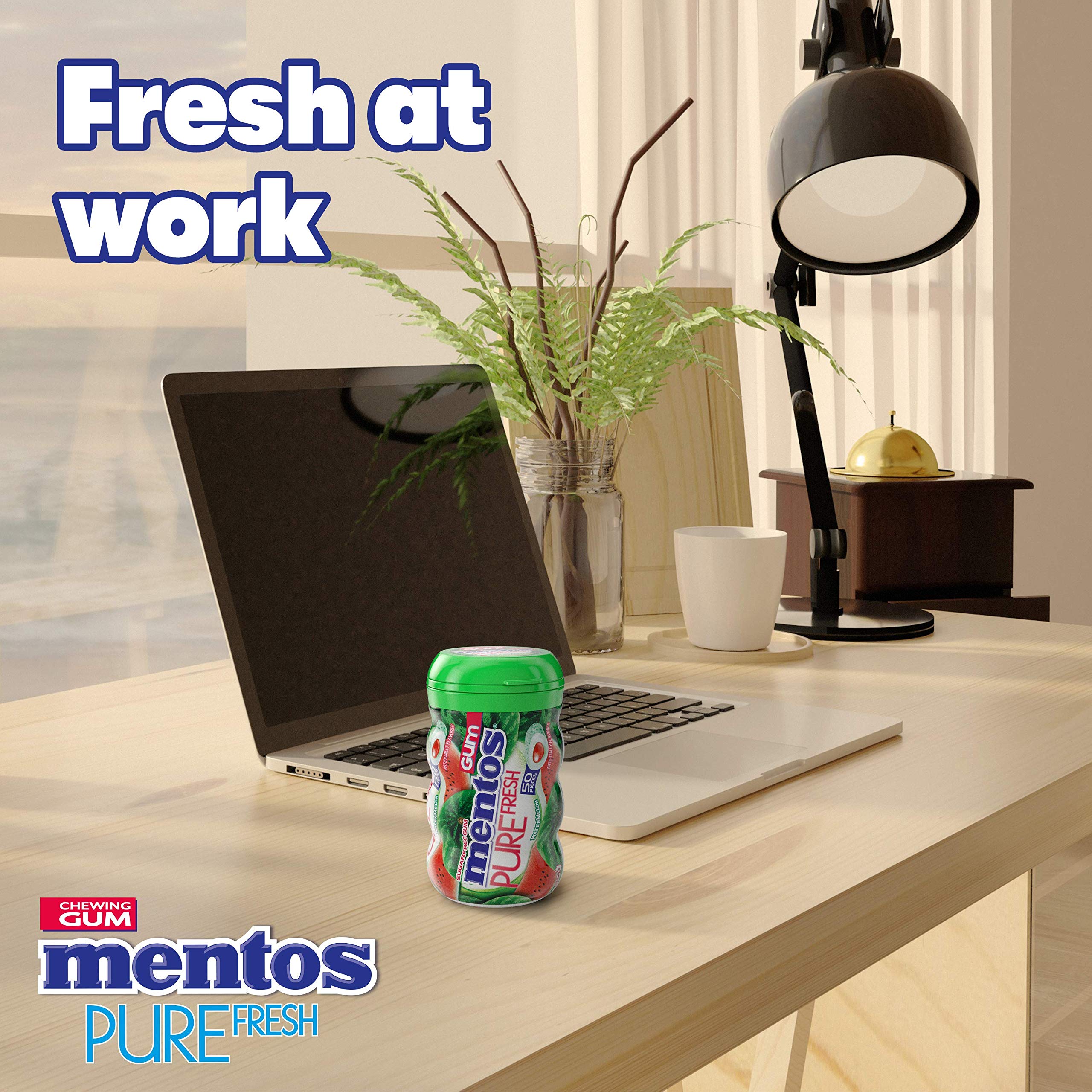 Mentos bottle open with watermelon gum pieces spilling out for easy grab-and-go