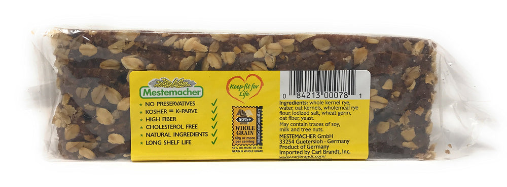 Hand holding Mestemacher loaf to show size and shelf-stable portability