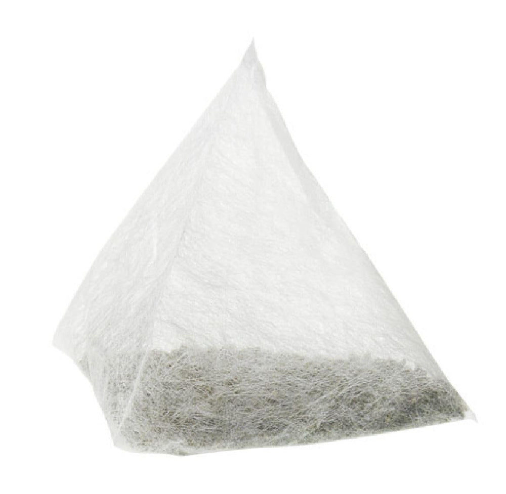 Metropolitan Tea close-up of tea bag and brewed cup, highlighting rich maple aroma and smooth body