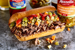 Mezzetta close-up spoonful of giardiniera showcasing crisp vegetables and spicy serrano flavor